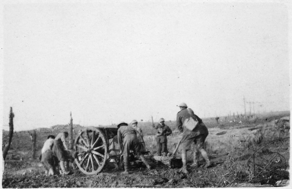 A gun crew, moving through mud at Passchendaele, 1917.